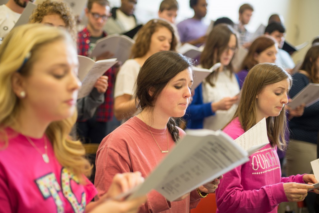 Junior Alexis Morgan, 2015 grad Madeline Hargis and junior Caroline Dunlap rehearse with the Ouachita Singers.