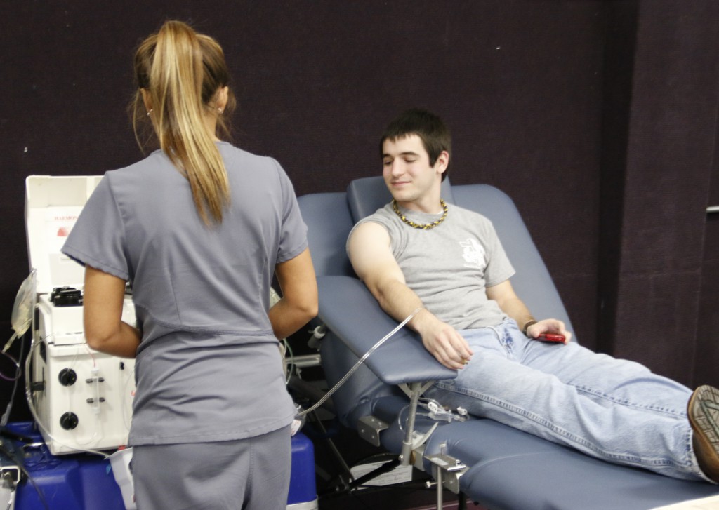 Freshman Ryan Graves gives blood at the blood drive held Wednesday, April 6th, in the Tiger Den. 