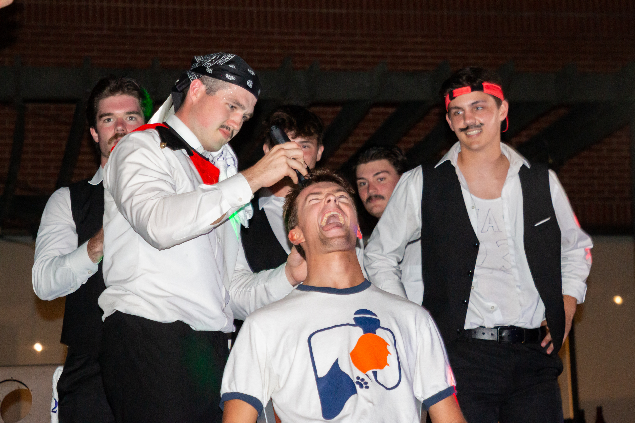 Braden Bunger gets his head shaved after final Tiger Tunes Show | Photo by Joshua Rhine