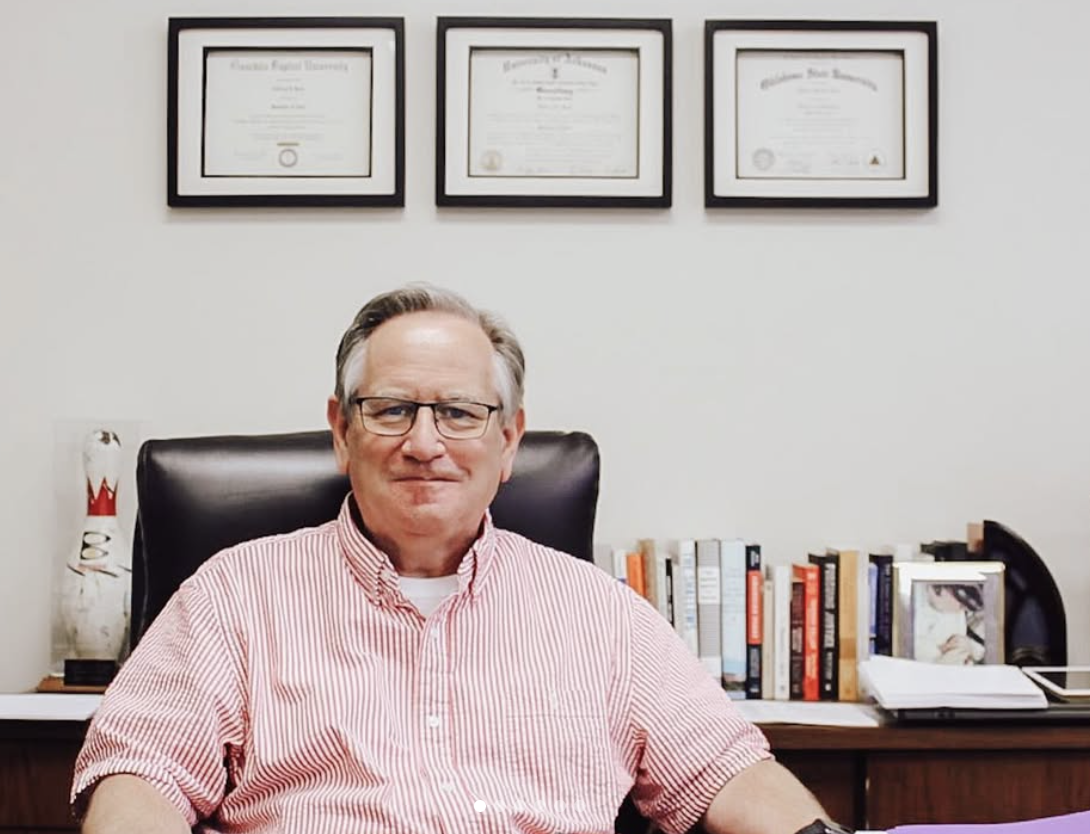 After 24 years as dean, Jeff Root returns to where teaching begins.