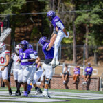 The tigers celebrate their Homecoming win | Photo by Joshua Rhine