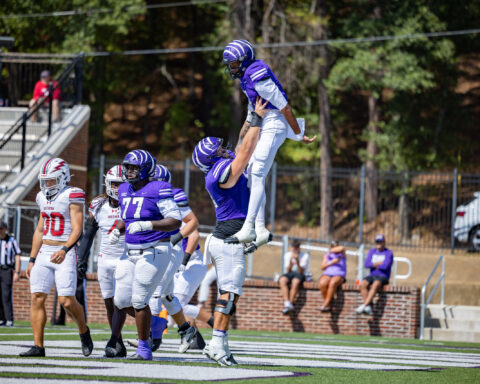 The tigers celebrate their Homecoming win | Photo by Joshua Rhine