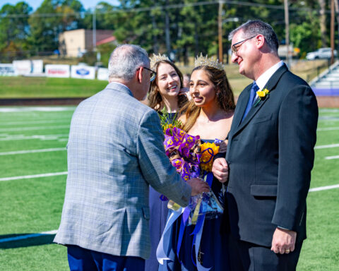 Silvi Cardona crowned Homecoming Queen by previous queen, Hannah Goodrum | Photo by Joshua Rhine